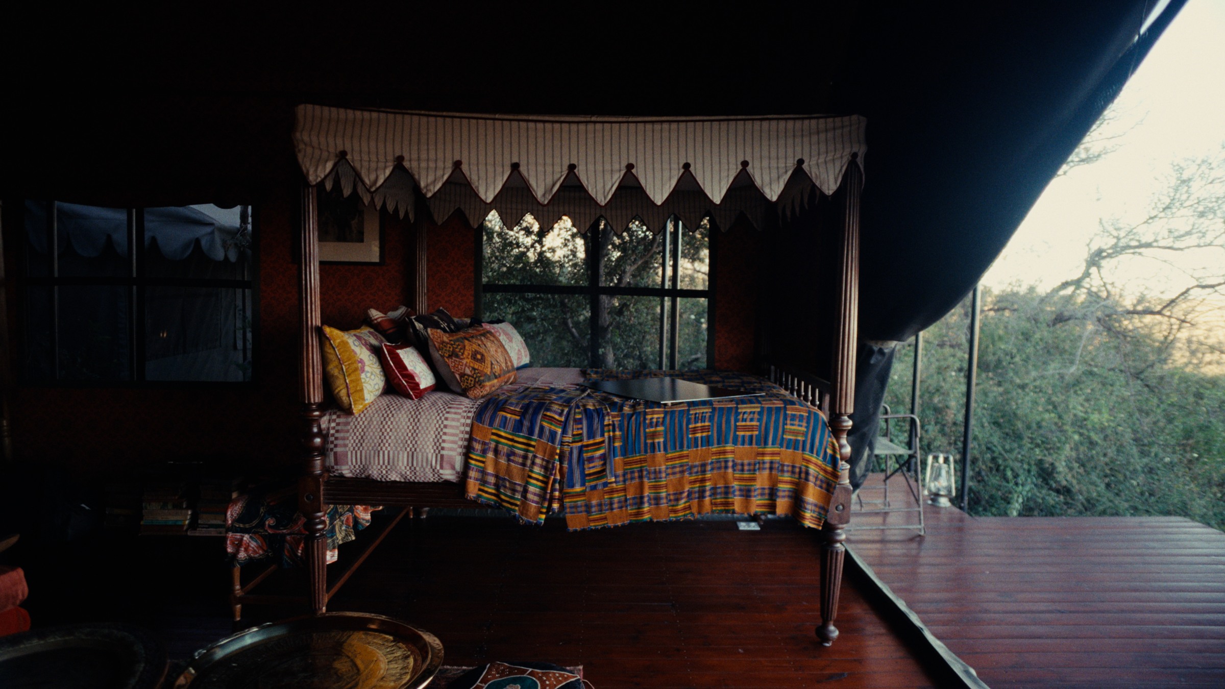A tented bedroom opening onto the landscape